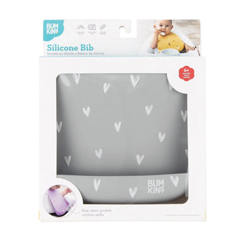 Bumkins Silicone Bib in Hearts pattern for 6m+; made of food-safe silicone with a catch-all pocket for spills.