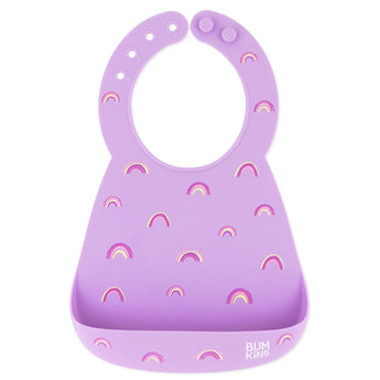 Bumkins Silicone Bib: Rainbows - Purple bib with buttons, rainbow patterns, and a pocket to catch mealtime messes.