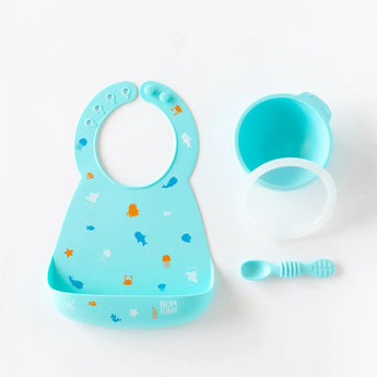 Bumkins Silicone Bib: Ocean Life set, featuring a blue bib, spoon, and bowl with sea creature designs for easy mealtime.