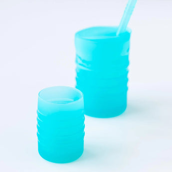 Bumkins Silicone Starter Cup: Blue features a ribbed small open cup for easy drinking and a taller straw cup.