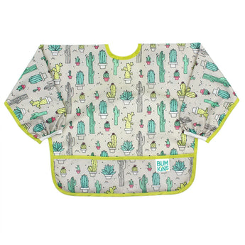 Bumkins Sleeved Bib: Cacti design, waterproof, beige with green trim, adjustable fit, pocket & logo on corner.