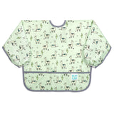 The Bumkins Sleeved Bib: Llamas has a pocket, dark trim, and waterproof fabric with a llama and cactus print.