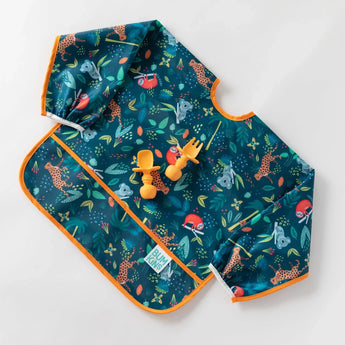 Bumkins Sleeved Bib: Jungle features giraffes and turtles, waterproof fabric, and comes with matching orange utensils.