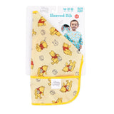 Bumkins Sleeved Bib: Winnie Loves Hunny is waterproof, features Winnie the Pooh, and fits babies 6-24 months. Perfect for weaning!.