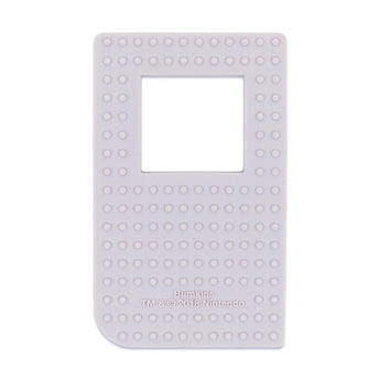 Bumkins Silicone Teether: Game Boy™ offers teething relief, featuring a white silicone design with a screen cutout and raised dots.