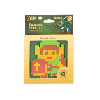 A Bumkins Silicone Teether: Zelda™ Link, shaped as a pixelated character, features green, red, and yellow colors.