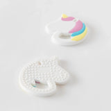 Bumkins offers a set of two unicorn-shaped Silicone Teethers, one textured and one smooth, featuring colorful, non-toxic accents.