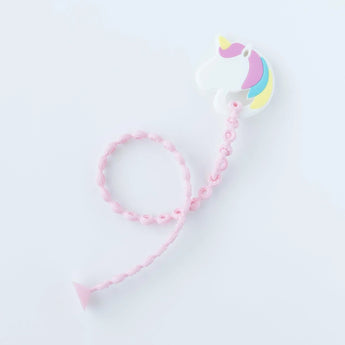 Bumkins Silicone Teether: Unicorn is a pastel pacifier clip on a pink chain, featuring non-toxic, unicorn-shaped beads for style and safety.