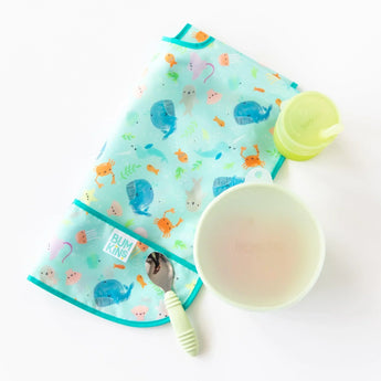 Ocean-themed baby set with green sippy cup and spoon. Pair with Bumkins adjustable Junior Bib: Ocean Life for a perfect fit.