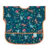 Junior Bib: Jungle by Bumkins - Adorned with jungle animals on a dark green background, featuring orange trim and an adjustable fit.