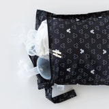 Bumkins Wet Bag: Mickey Mouse Icon Black + White - waterproof, ideal for organizing breast pump parts and more without spills.