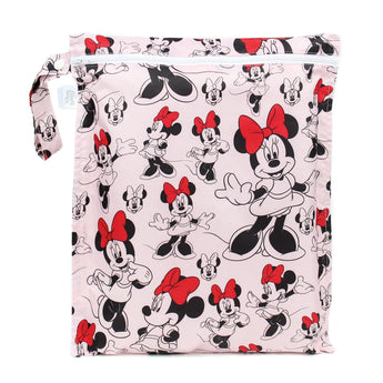 The Wet Bag: Minnie Mouse Classic by Bumkins is a pink travel organizer with Minnie in red bows on waterproof fabric.