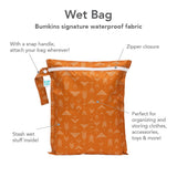 The Bumkins Wet Bag: Grounded features waterproof fabric, a white arrow design, snap handle, and zipper for versatile wet item storage.